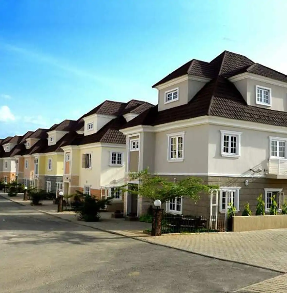 A row of modern residential buildings representing estates using Sylogate's security and access management platform.